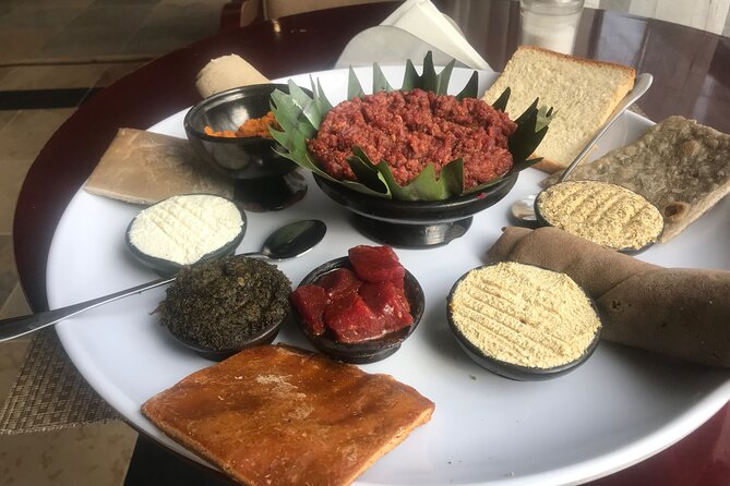 Go wheretheLocalsgo, Eatwhat thelocalseat!open Market&More Tours - The Lion of Judah and the city’s symbols