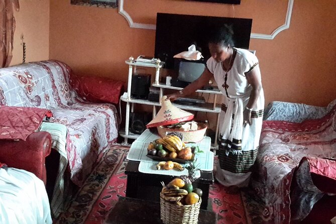 Private Ethiopian Home Cooking Class in Addis Ababa with Transfer - Sitting down to eat in the family home